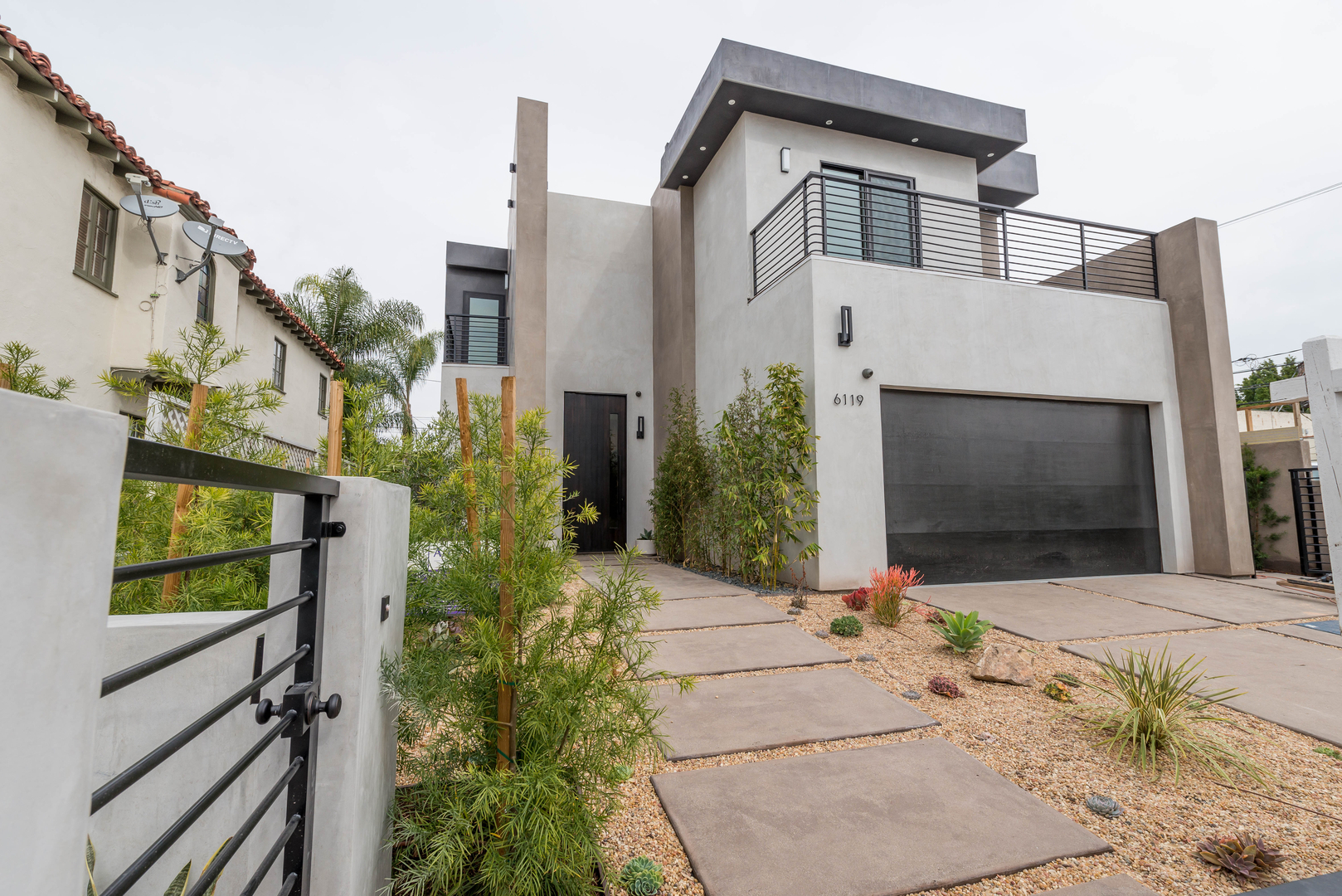 Modern house with landscaped front yard.