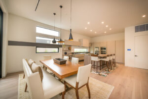 Modern spacious kitchen and dining area interior design.