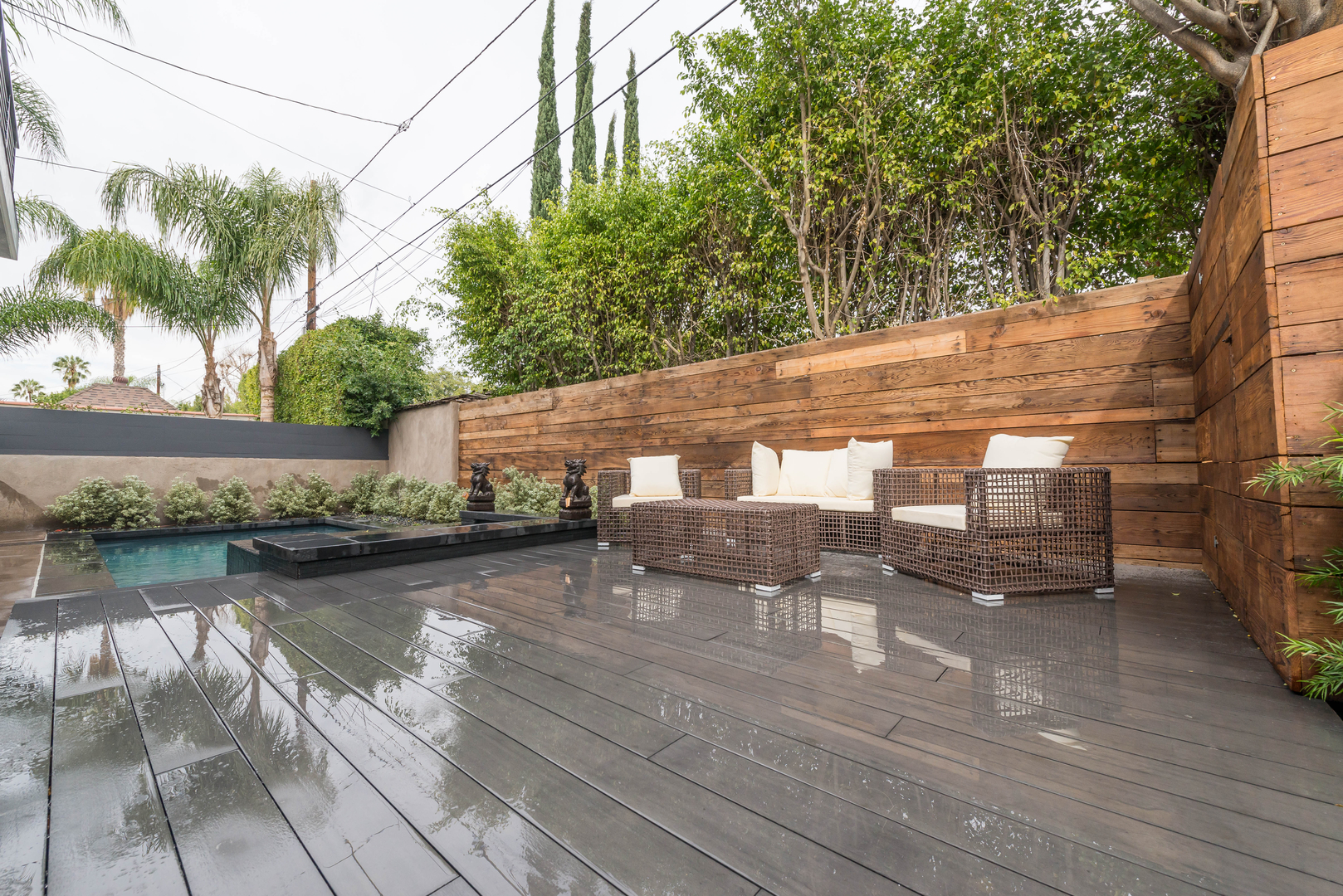 Modern backyard with deck and outdoor furniture