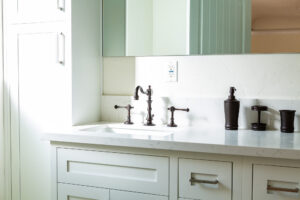 Modern bathroom sink with dark fixtures