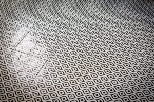 Geometric pattern tiles with contrasting shades.