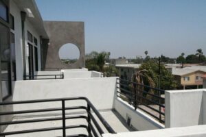 Modern balcony architecture with circular design element.