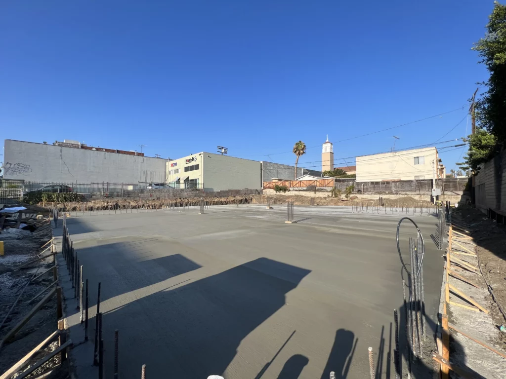 Empty urban lot with clear skies.