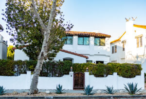 White Spanish-style house with terracotta roof tiles