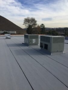 Commercial HVAC units on flat rooftop