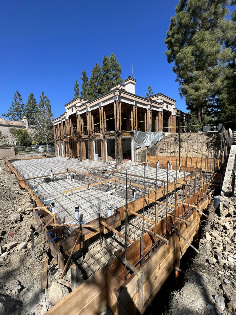 Historic building renovation with new foundation construction.