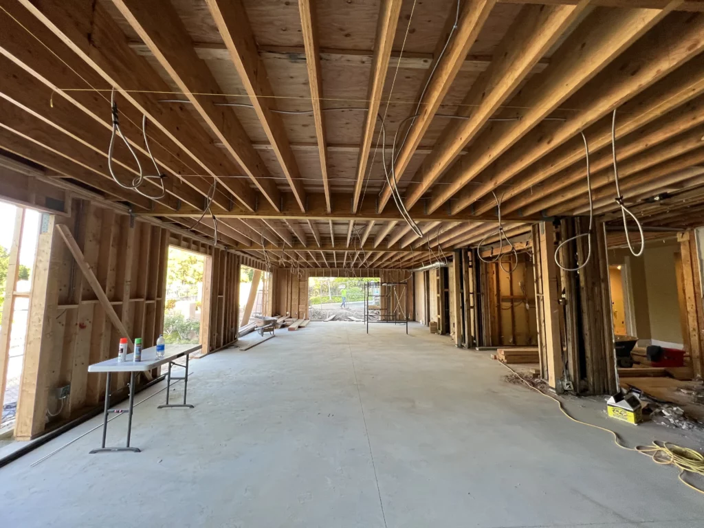 Interior framework of residential construction site.