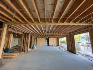 Interior construction site with exposed wooden beams