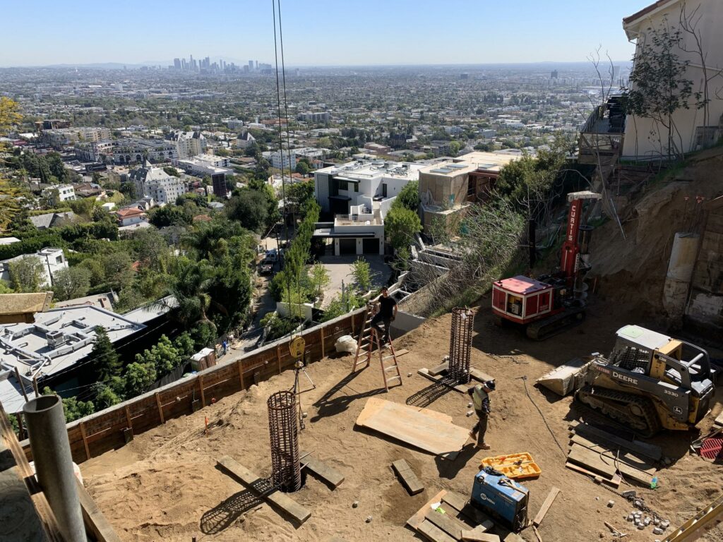 Urban construction site with cityscape in background.