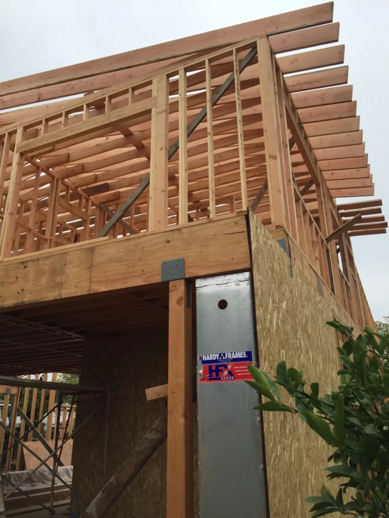 Wooden house framing under construction