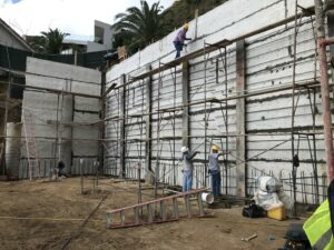 Workers on scaffolding at construction site