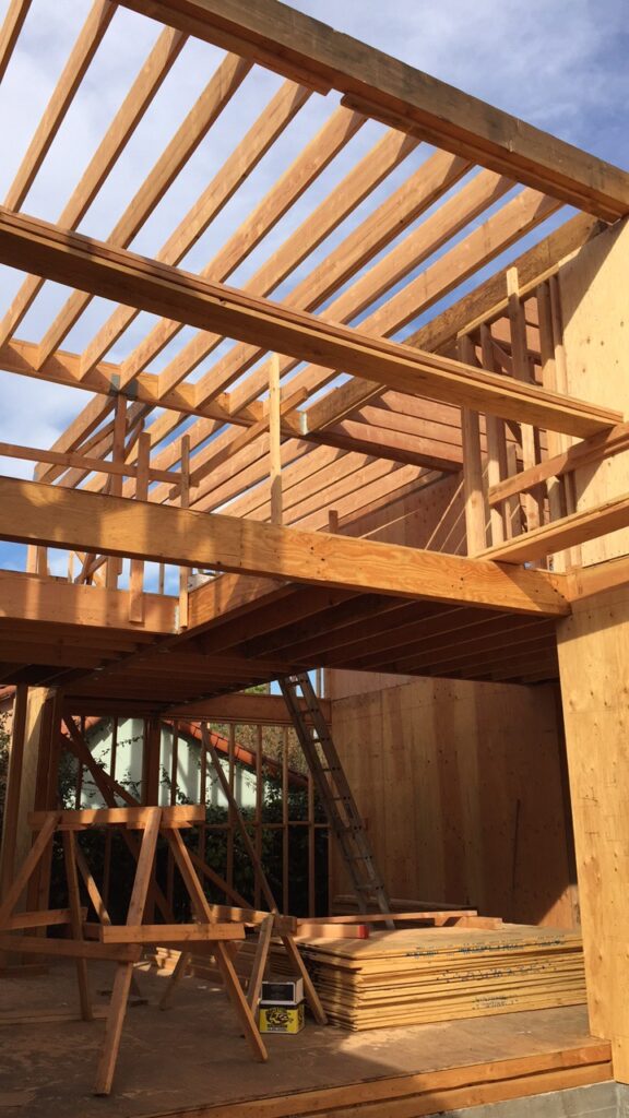 Wooden house frame construction site