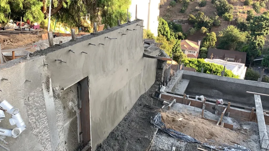 Construction site with retaining wall progress