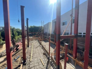 Construction site with steel beams and sunny sky
