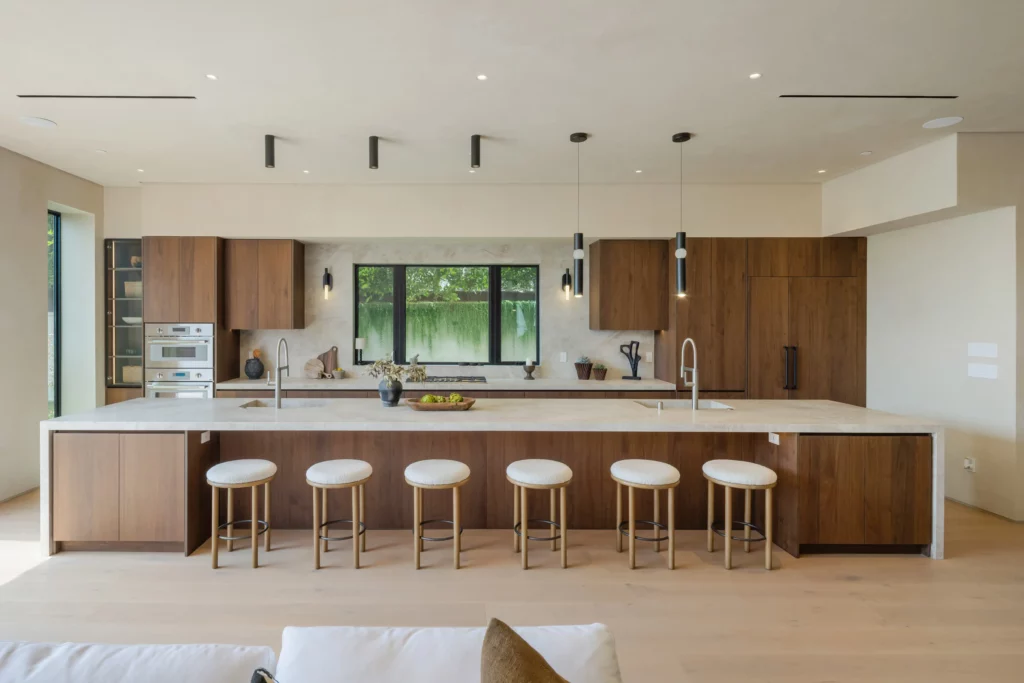 Modern kitchen with wooden cabinets and breakfast bar