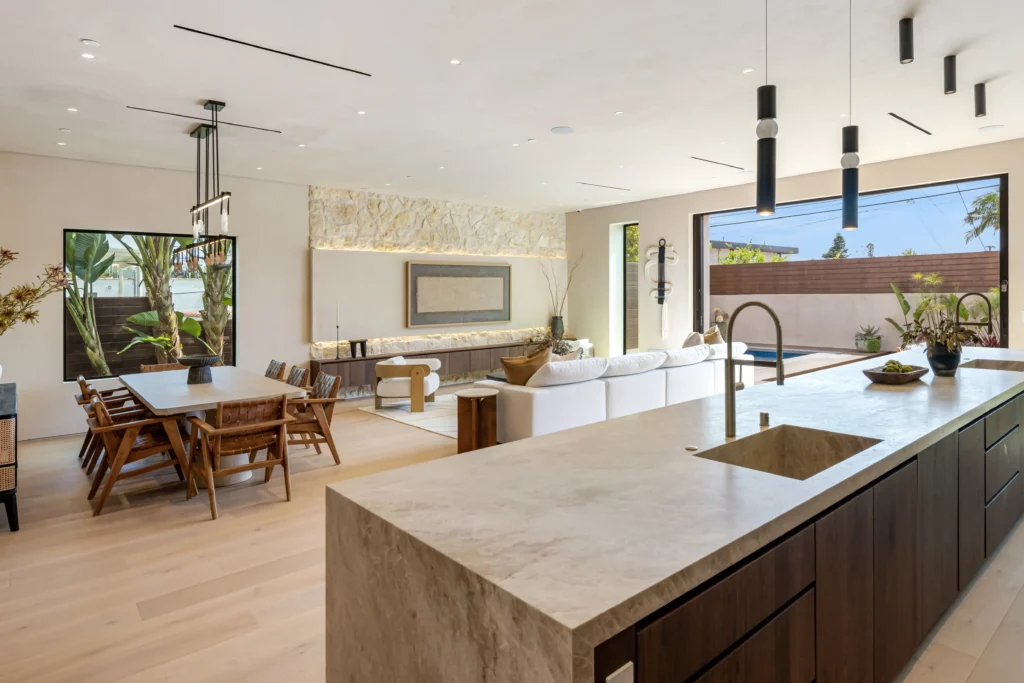 Modern kitchen with dining area and outdoor view