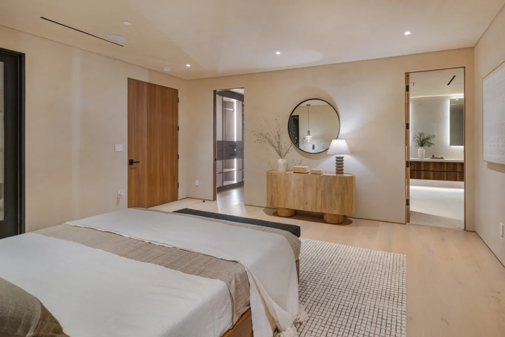 Modern bedroom with elegant decor and wooden furnishings